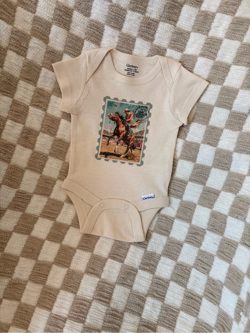 Cream Cowboy Stamp Graphic Baby One-Piece Bodysuit